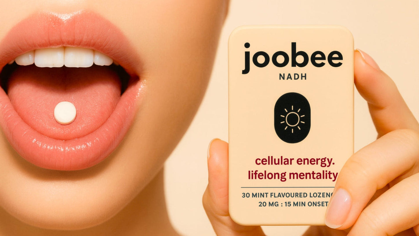 Joobee NADH Lozenges - Person holding lozenge and package